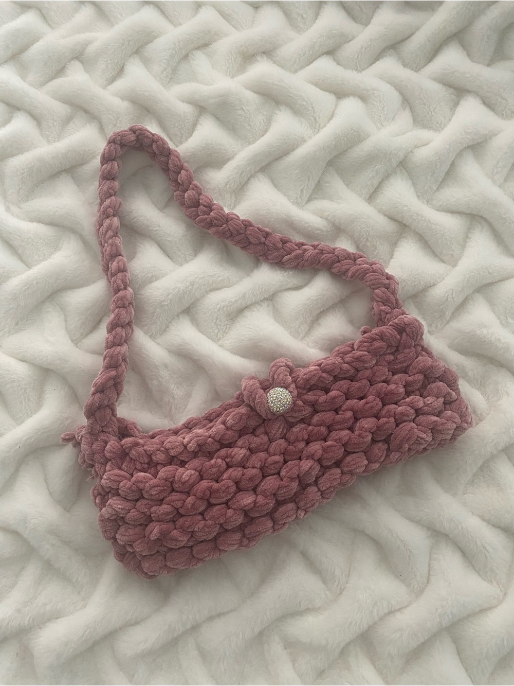 CHUNKY crochet shoulder bag featuring a braided strap and jeweled button.